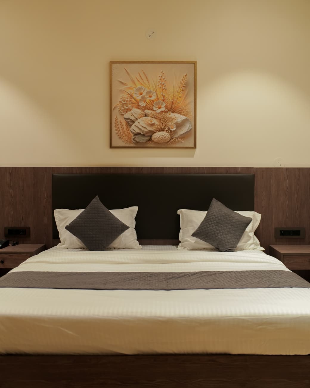 A calm guest room at The Zennith Suites